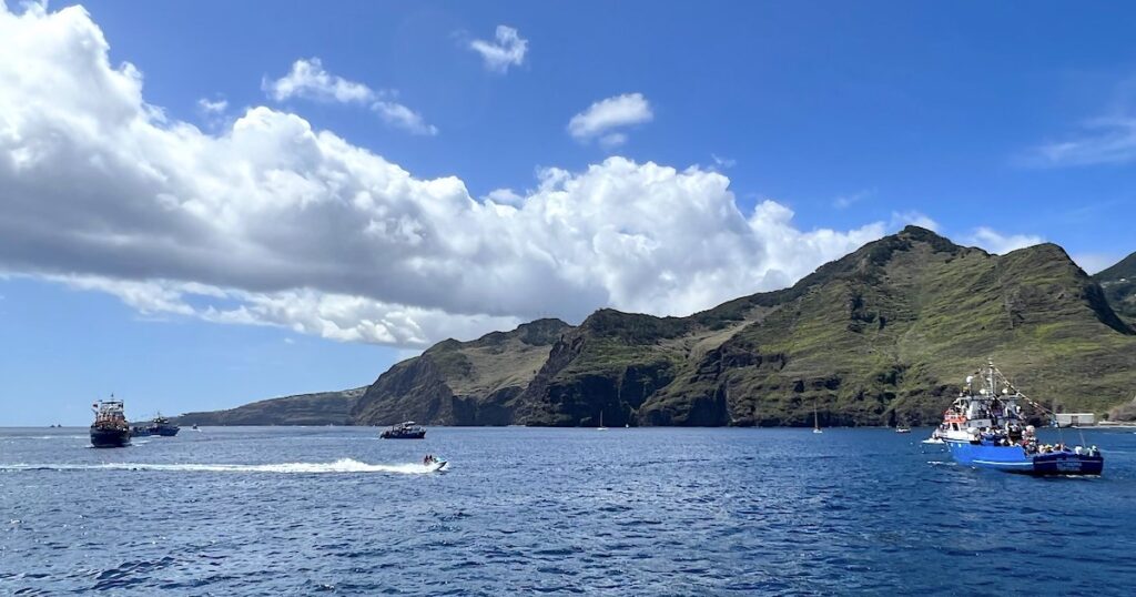 Fishing boats sail off the coast of Caniçal and the east coast of Madeira.