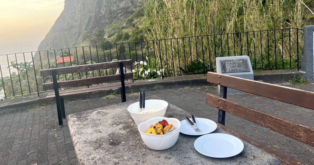 Pasta salad in bowls on an outdoor table in Sao Vicente.